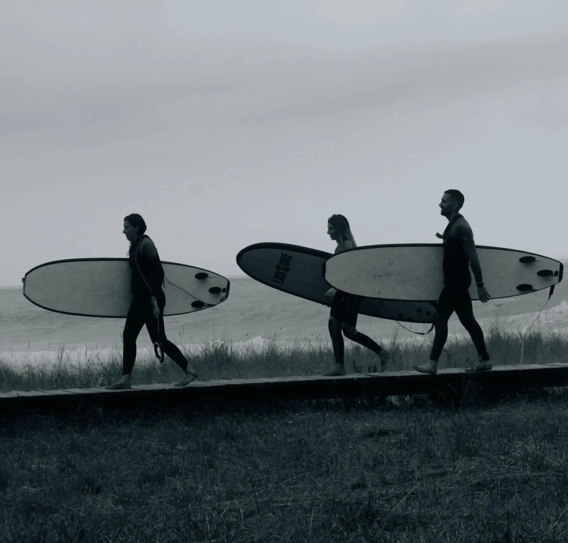 Surfers near Lisbon